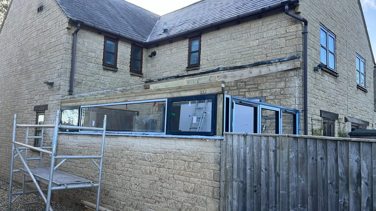 The elevation before the garden room was built